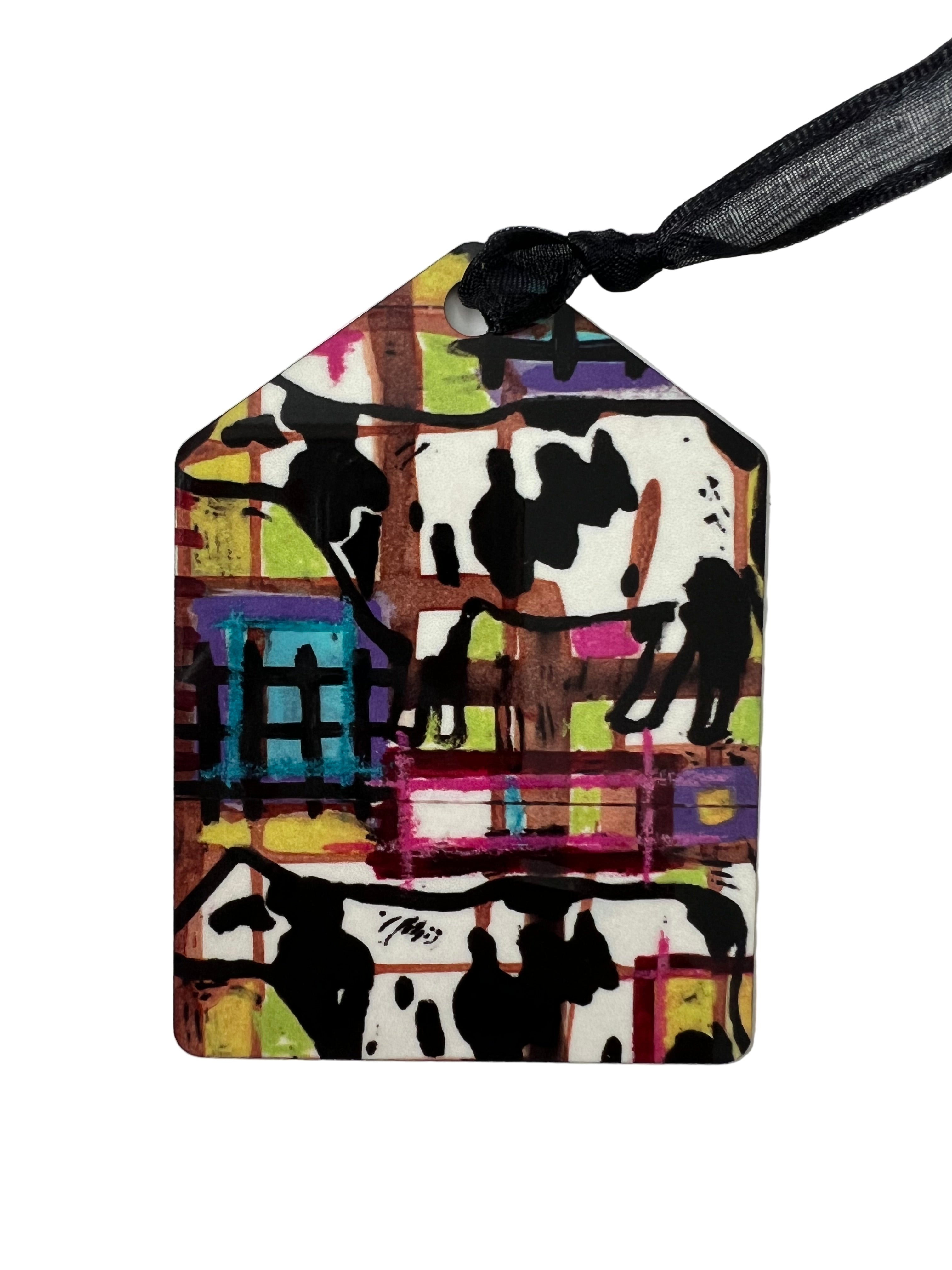 Cows on pentagon shaped ornament